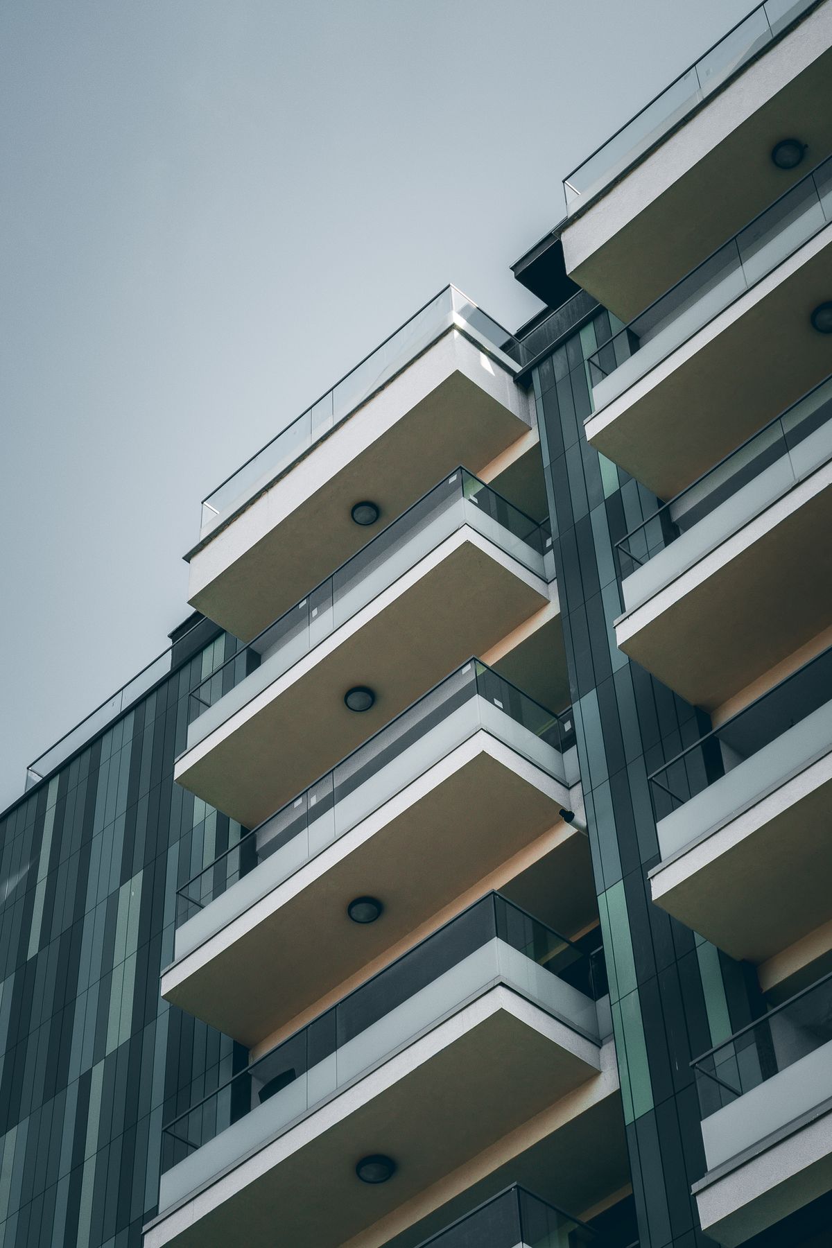 Contemporary building with geometric balconies.